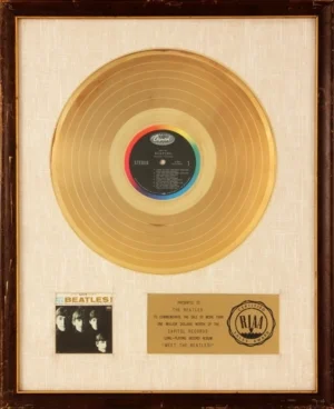 Understanding RIAA Gold Records: RIAA Platinum Record Award for the MEET THE BEATLES album from 1977.