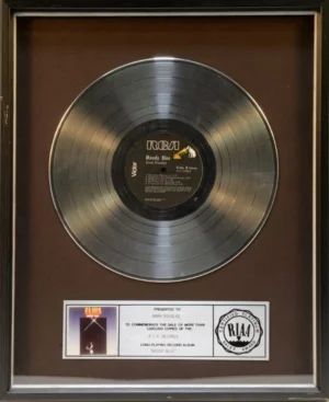 Understanding RIAA Gold Records: RIAA Platinum Record Award for Elvis Presley's MOODY BLUE album from 1977.